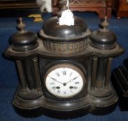 A late 19th/early 20th Century Black Marble Colonnade style Mantel Clock with domed top, applied
