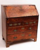 An 18th Century Walnut Veneered Bureau, of typical form with drop down front opening to reveal an