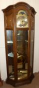A late 20th Century Oak Cased Triple Weight-Driven Longcase Clock with moon phases, the glazed one-
