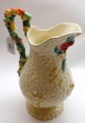 A Clarice Cliff Celtic Harvest Single-handled Jug, typically decorated with floral detail on a