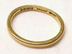 A hallmarked 22ct Gold Wedding Ring, weighing approximately 2 ½ gm (misshapen)