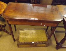 A mid-19th Century Mahogany Folding Card Table with inlaid banding, raised on four turned legs,