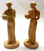 A pair of early 20th Century Composition Figures of young ladies, marked to base “Rocksyn” (one with