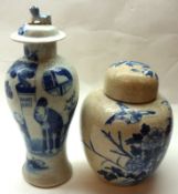 A Chinese Covered Ginger Jar, decorated in underglaze blue with birds and foliage on a crackle glaze