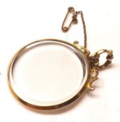 An Edwardian hallmarked 9ct Gold Circular Photo Locket (vacant) with glazed back and front,