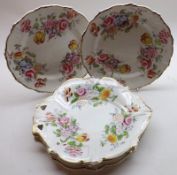 Three mid-19th Century Single-handled Dessert Serving Plates, patterned with floral sprays and two