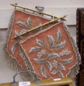 A pair of late 19th Century Wall Mounted Beadwork Shield-shaped Panels, decorated with floral