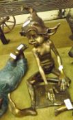 A modern Bronze Figure of a seated pixie, 16” high