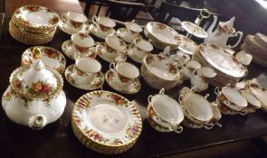 A Royal Doulton “Old Country Roses” Tea/Dinner Service, comprises Teapot, eight Cups and Saucers and