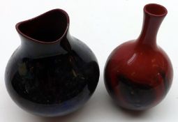 A small Royal Doulton Flambé veined narrow necked Vase; together with a further Royal Doulton wide