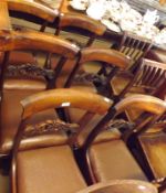 A set of six Victorian Rosewood Bar Back Dining Chairs with scroll pierced centre rails, brown