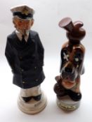 Two 20th Century Novelty Musical China Decanters, Jolly Sailor and Punch Drunk, largest piece