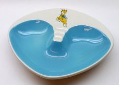 A Beswick Babycham Dish, decorated with Babycham Deer on a white and blue background, 11” wide