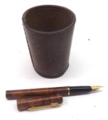 A small stitched Brown Leather Cup