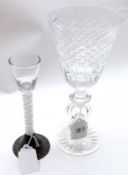 An 18th Century Wine Glass with plain funnel bowl and double opaque twist stem, terminating in a tin