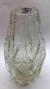 A 20th Century Clear Glass Studio Vase with bark type decoration in the Whitefriars manner, 10” high
