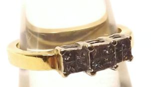 A hallmarked 14ct Gold Ring, set with three square panels each of four Princess Cut Diamonds