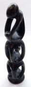 A 20th Century Polished Stone Abstract Pierced Ornament, modelled as a seated figure, unsigned,