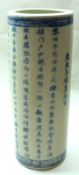 A Chinese Cylinder Vase, the body decorated in underglaze blue with lines of inscriptions or