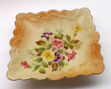 A Carlton China Side Dish with frilled edge, decorated with central coloured floral sprays on a