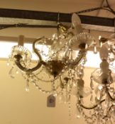 A 20th Century Three Branch Chandelier with extensive prismatic drops