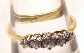 An 18ct Gold and Platinum five small Old Cut Diamond Ring, stamped “18ct & Plat”