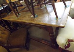 A large 20th Century Rectangular Oak Refectory style Dining Table, on heavy turned baluster legs and