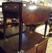 A 19th Century Mahogany Pembroke Table of typical form with shaped dropped leaves, single drawer,