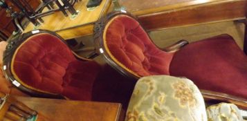 A Victorian Mahogany Framed Armchair, upholstered in pink fabric, raised on short front cabriole