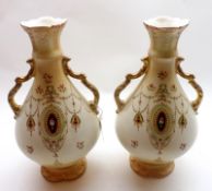 A pair of Fieldings Crown Devon Double-handled narrow-necked Vases, typically decorated with swags