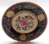 A 19th Century Spode Side Plate, decorated with central floral motifs with a blue and gilt