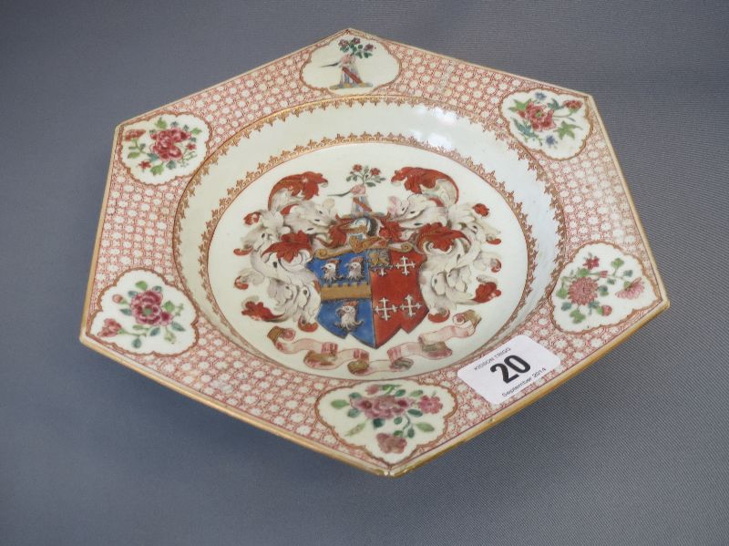 Late C18 Chinese armorial export hexagonal soup plate decorated, an armorial and crested a fist