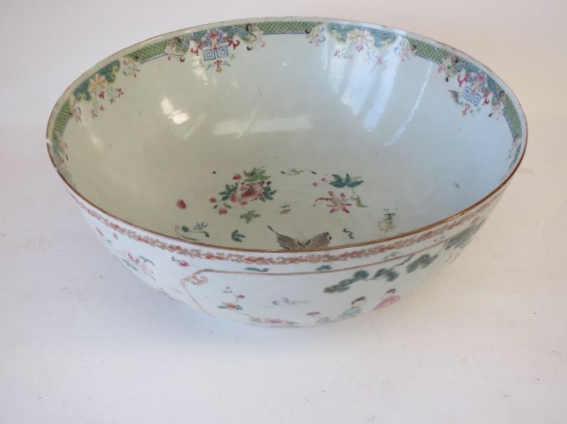 Large Chinese famille rose punch bowl decorated panels of female figures and garden scenes