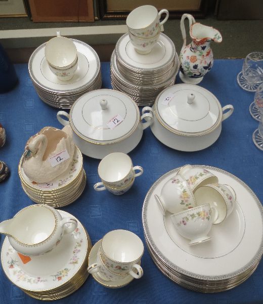 Wedgwood `Mirabelle` part teaset, 12 cups, 13 saucers, milk jug, sugar bowl, 12 plates, a ceramic