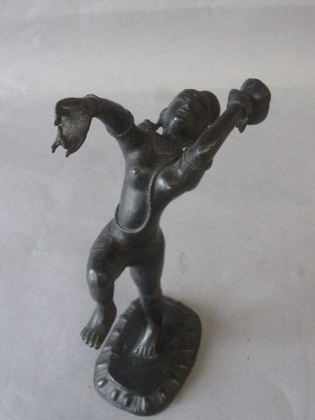Bronze figure of a semi-clad female Indian dancer standing on lotus base 28H