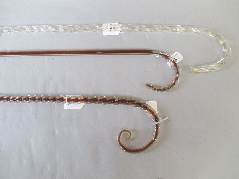 Amber twist glass walking stick together with clear spiral twist glass & another (a/f) (3)