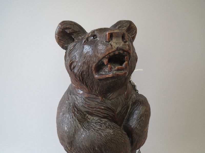 Good C19th German Black Forrest model of a standing bear shackled to a rock, the well carved