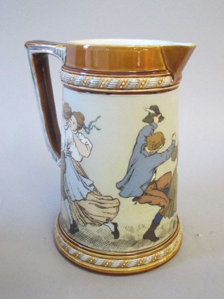 Mettlach stoneware beaked tankard decorated with continuous band of dancing figures 15.5H