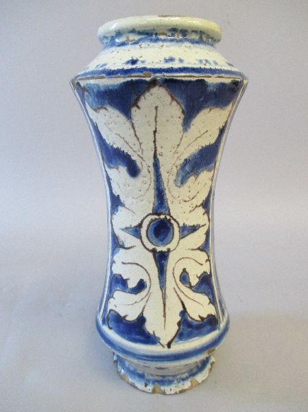 Mediterranean tin-glazed blue & white pottery drug jar (possibly Italian C18th) the waisted