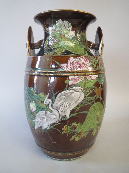 Good C19th Staffordshire treacle glazed porcelain ovoid vase finely enamelled with cranes amongst