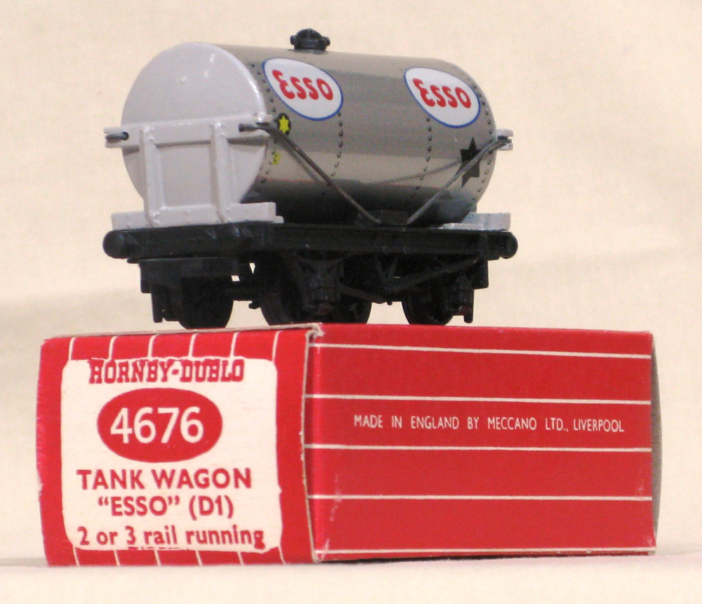 4676 Tank Wagon ?Esso? (silver). Open brake gear with early plastic couplings. Mint wagon in a mint