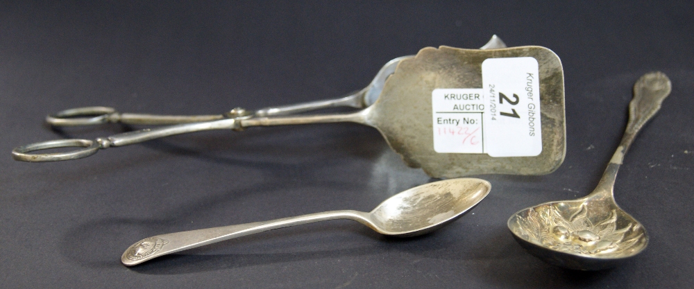 Repoussé spoon, white metal serving tongs and silver spoon (marked The Liverpool Bulldog Club)