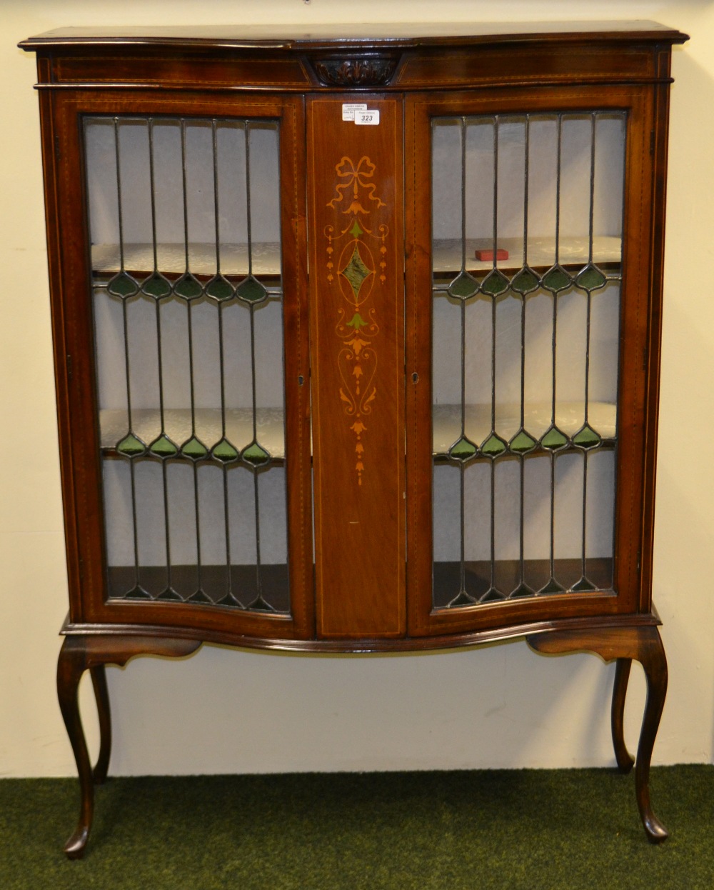 Edwardian mahogany inlaid two-door display cabinet raised on Queen Ann supports