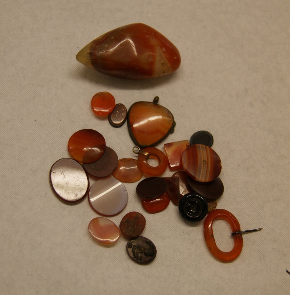 Approximately ten carnelian-type stones