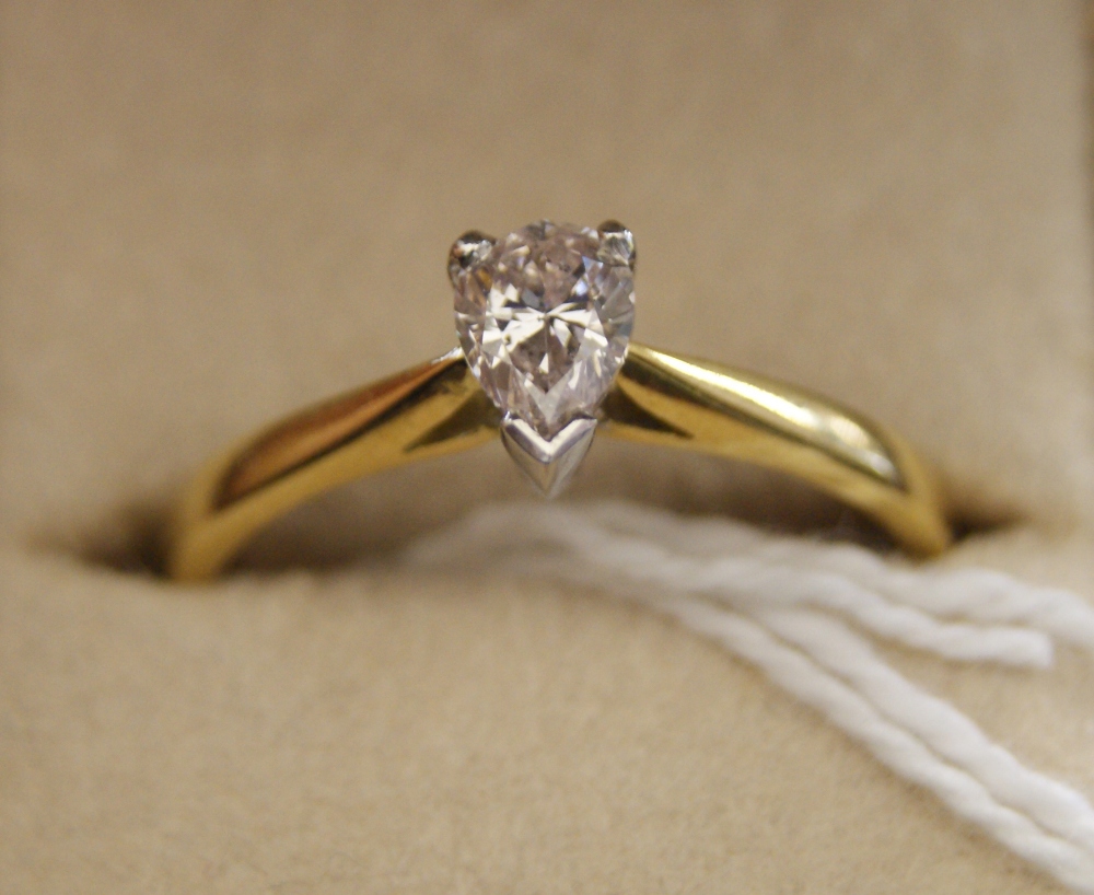 18ct yellow gold ladies' solitaire dress ring, pear shaped diamond of approximately 0.47 carat.