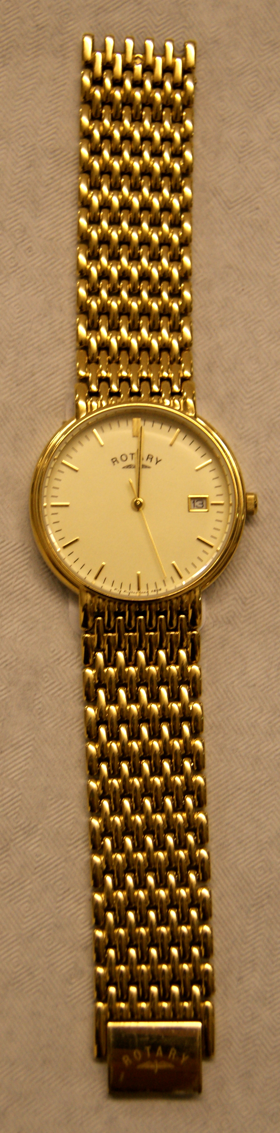 Rotary gentleman's wristwatch on yellow metal bracelet CONDITION REPORT; Clasp link missing. Battery