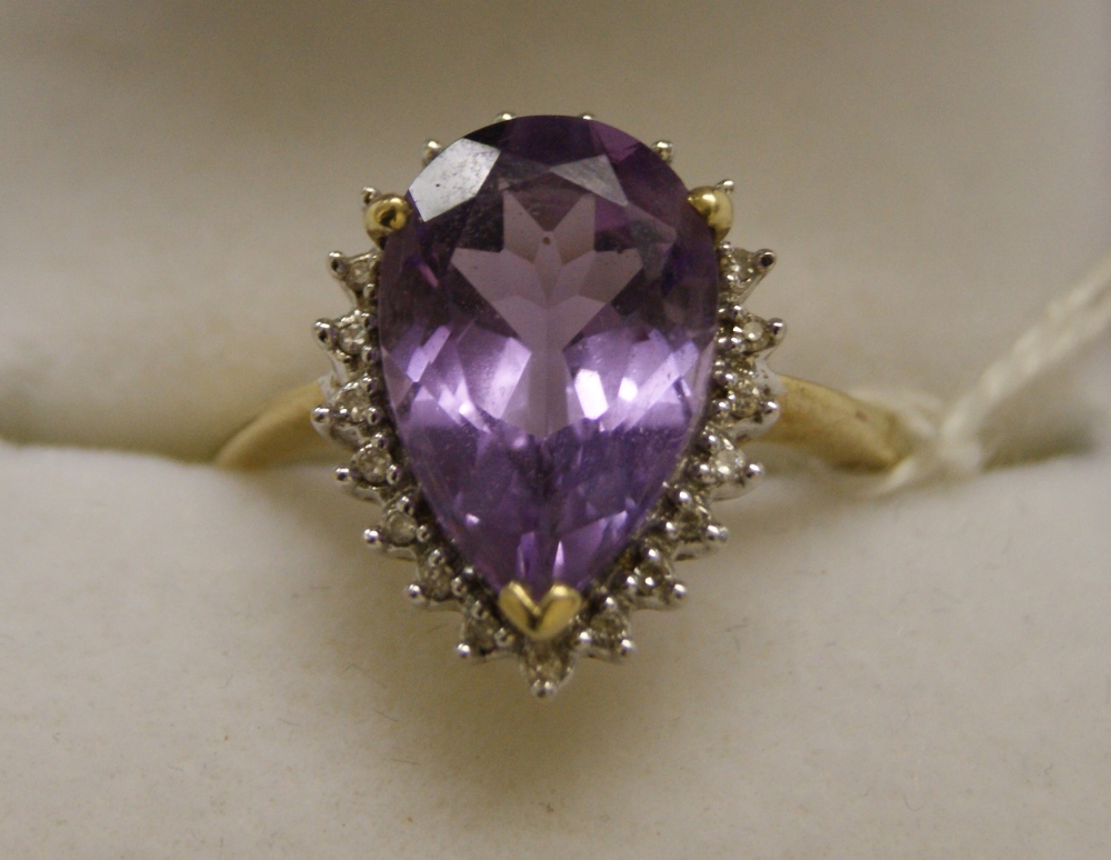9ct gold amethyst and diamond cluster ring. Approximate size U. Total approximate weight 4.6g.