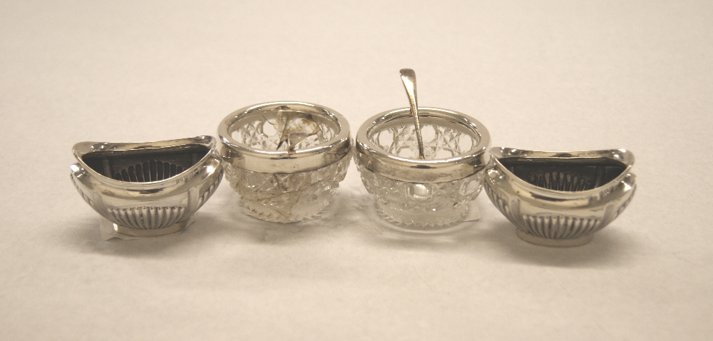 Pair of silver open salts and a pair of cut glass and silver-mounted salts