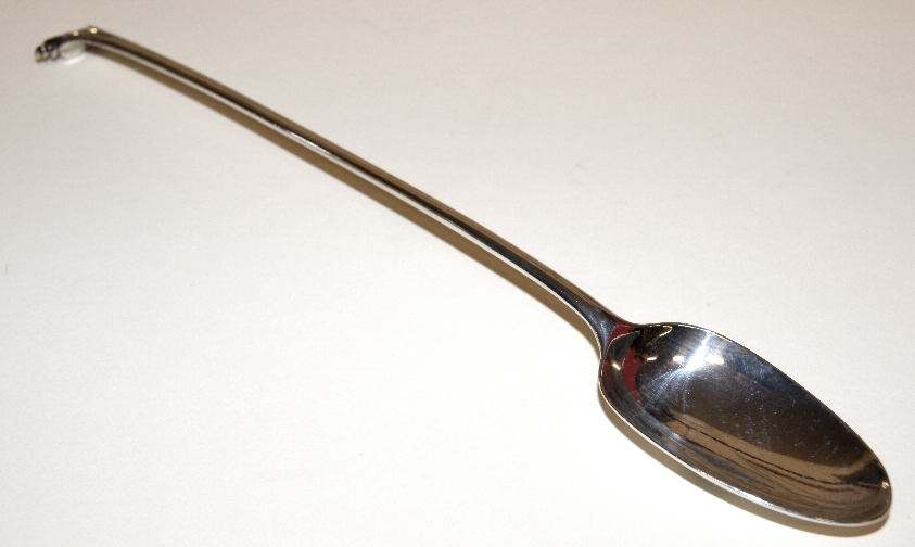 Hallmarked silver serving spoon, circa 1770. Maker Thomas Wright, London Assay. Date letter