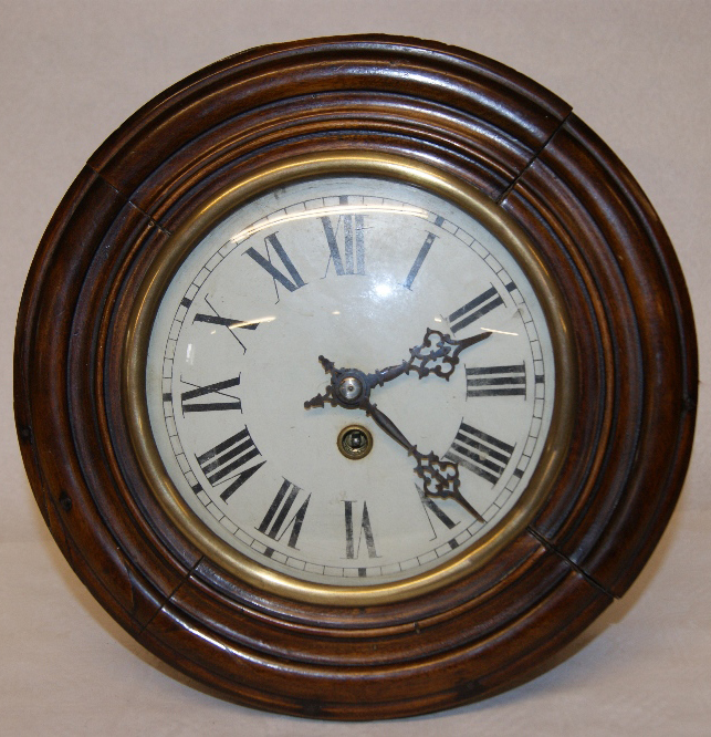 French mahogany-cased wall clock with pendulum and key